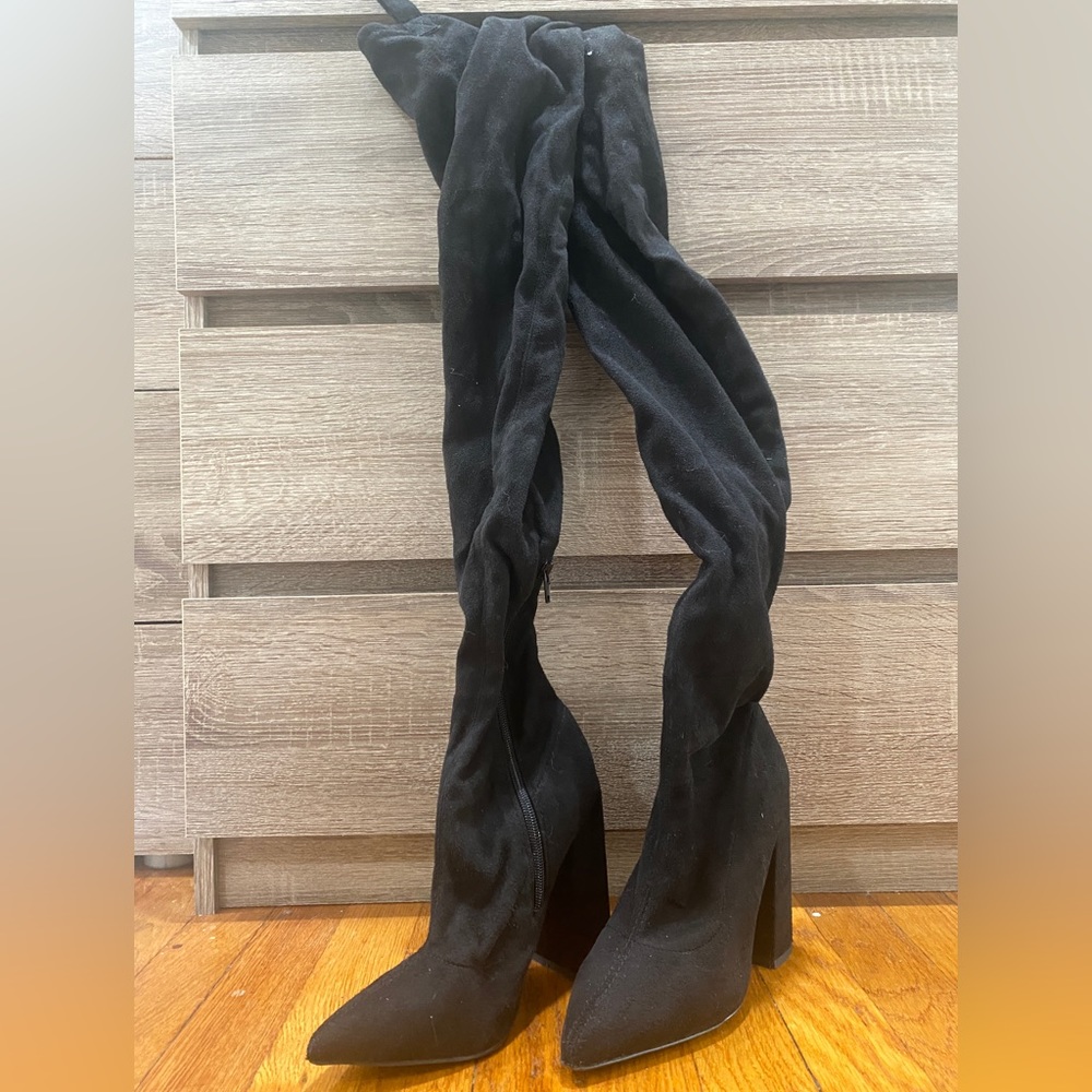 Black thigh high boots